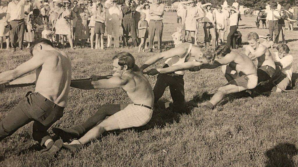 Photos of tug-o-war competitions from days gone by. 