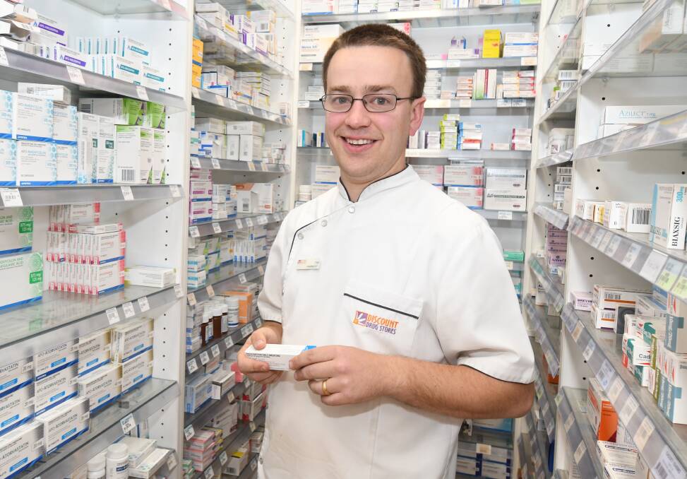 TIME TO VACCINATE: North Orange Discount Drug Store pharmacist Tim Denham is encouraging people to get vaccinated against influenza. Photo: JUDE KEOGH