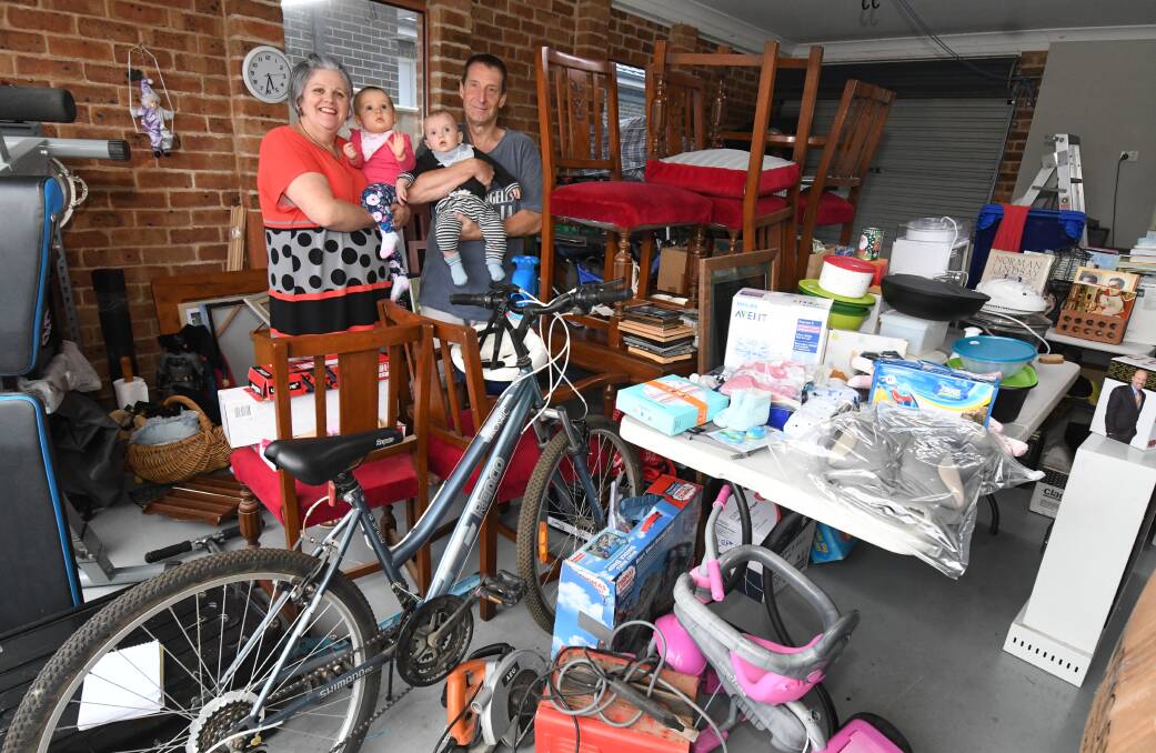 FUNDRAISING: Trish Streatfeild, Harriet Mennen, Paddy McCann and Wayne Streatfeild with some of the items that were donated for the monster garage sale. Photo: JUDE KEOGH