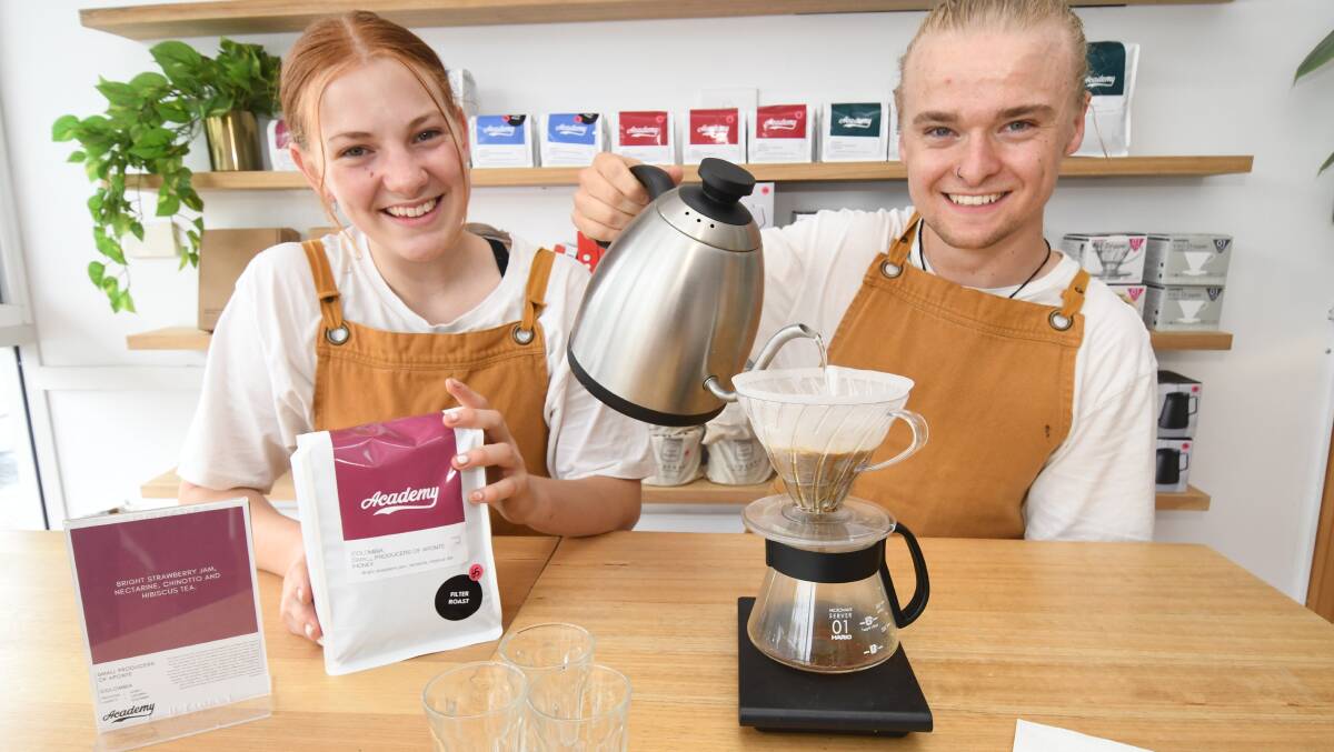 SELECTION: Academy Coffee's Abigail Kittler and Lukas Cooke with the brew. Photo: JUDE KEOGH