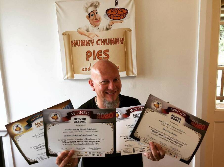 AWARD WINNER: Hunky Chunky Pies owner Ben Henry with his awards. Photo: SUPPLIED 