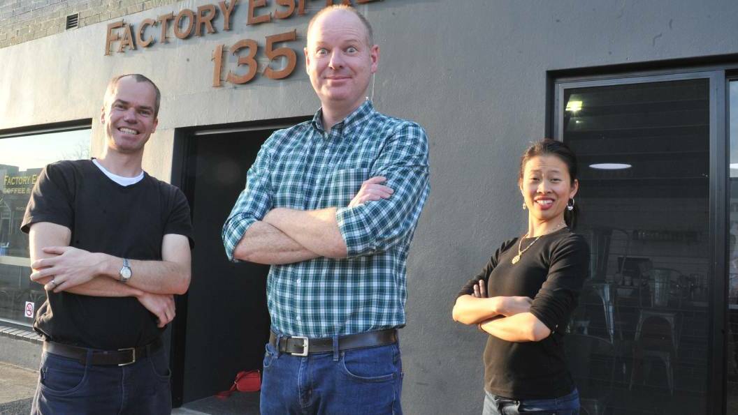LIGHTEN UP: Tom Gleeson, centre, pictured with Nick and Ruby Gleeson from Factory Espresso will perform early next year. Photo: JUDE KEOGH