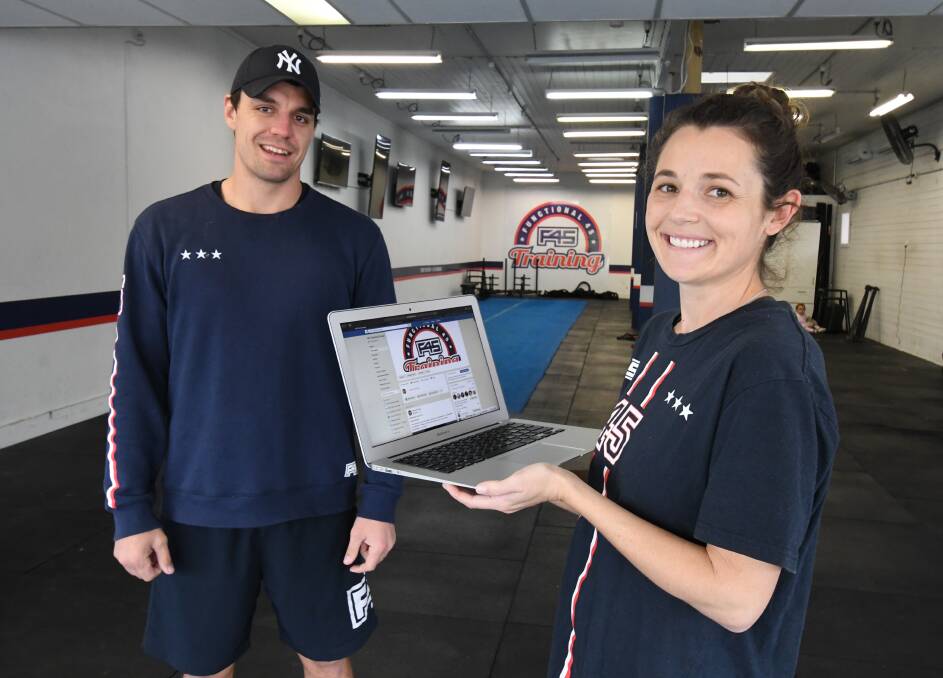 CONNECTED: Sam and Abbi Powell from f45 Gym are using technology to reach out to people who want to keep fit without leaving home. Photo: JUDE KEOGH