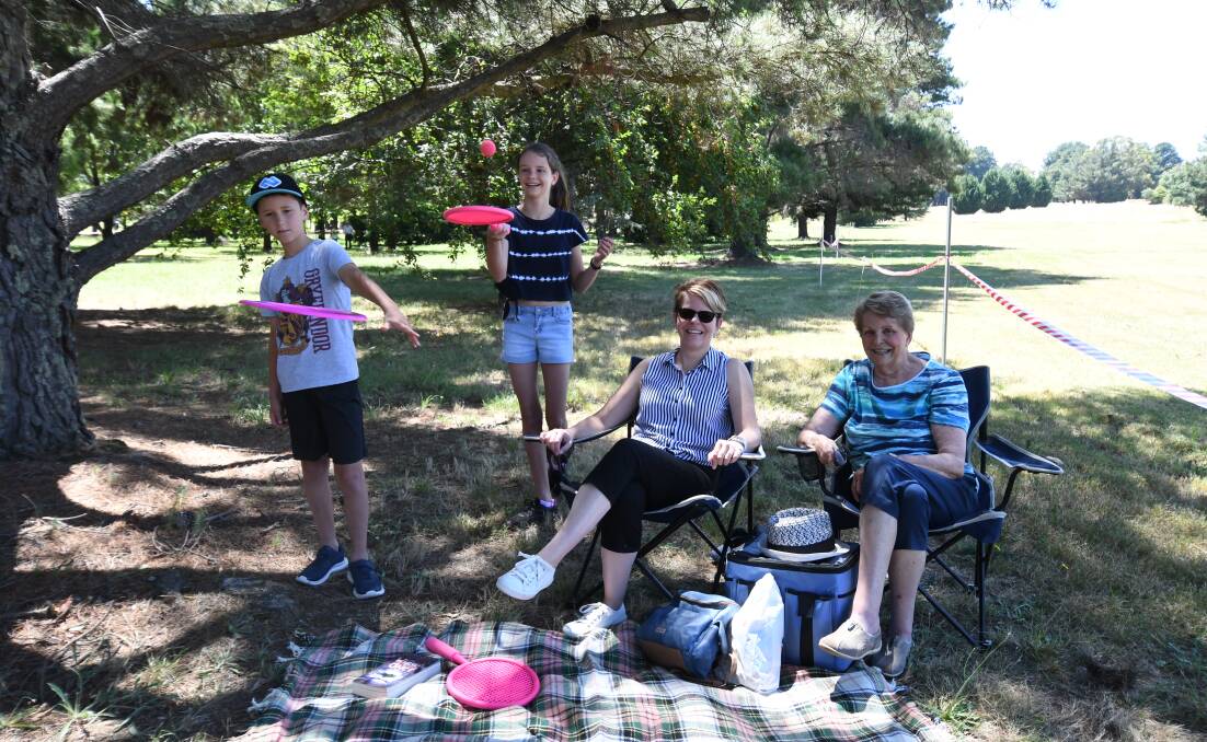PICNIC Nick, Laura and Michelle Wood and Diane Stacey relaxed in the shade of some of the trees that could be knocked down. Photo: CARLA FREEDMAN 0412cfbloomfield4