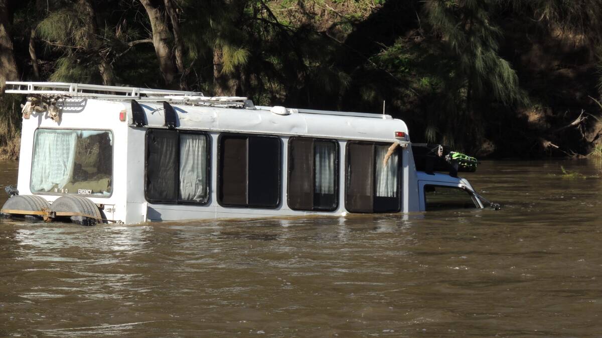 A campervan was submerged in the Macquarie River after apparently being swept off the causeway at Dixons Long Point in August 2021. Picture supplied