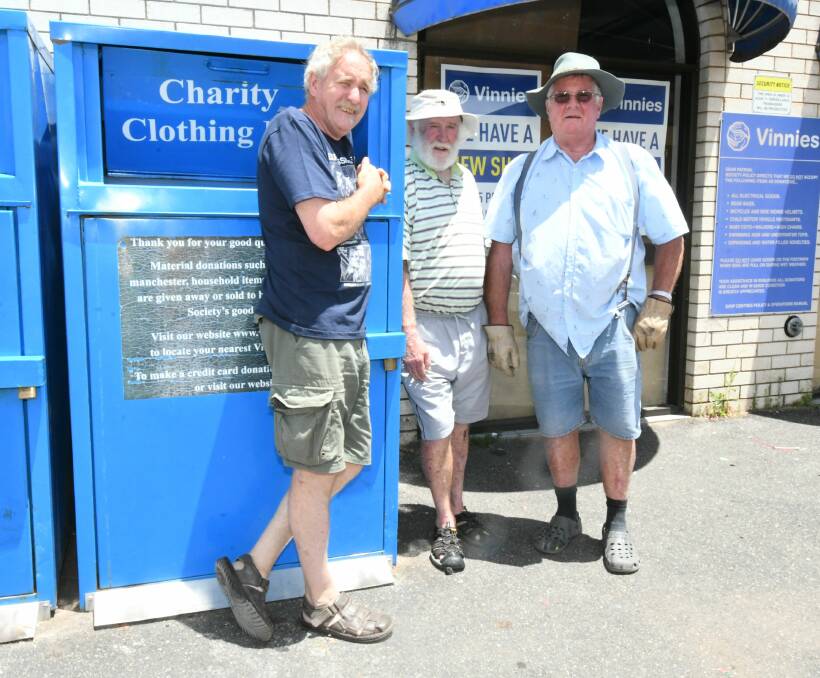 BUSY PERIOD: Roger Anderson, Bob Lulham and Bernard Carroll have been collecting the donated items from the Vinnies bins. Photo: CARLA FREEDMAN