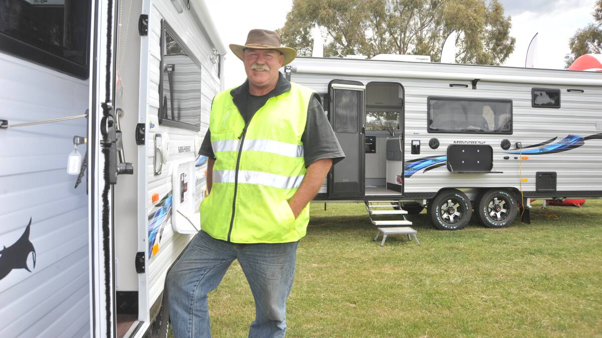 LIFESTYLE EXHIBIT: Paul Mitchell set up the New Age Caravans at the Australian National Field Days site on Wednesday. Photo: JUDE KEOGH 1025jkfield6