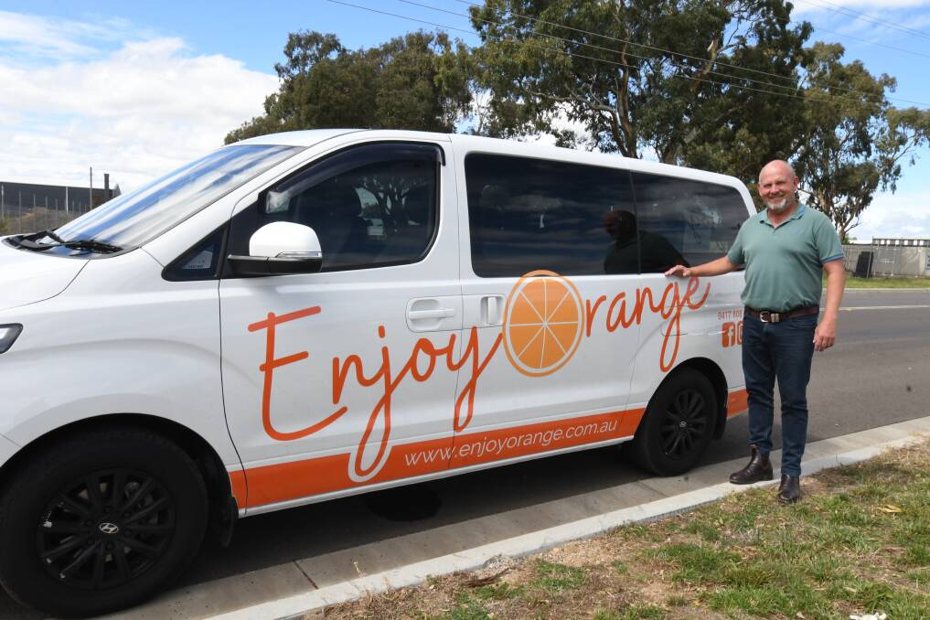 SERVICE: Enjoy Orange co-owner Jason Hamling with the business's new van. Photo: JUDE KEOGH