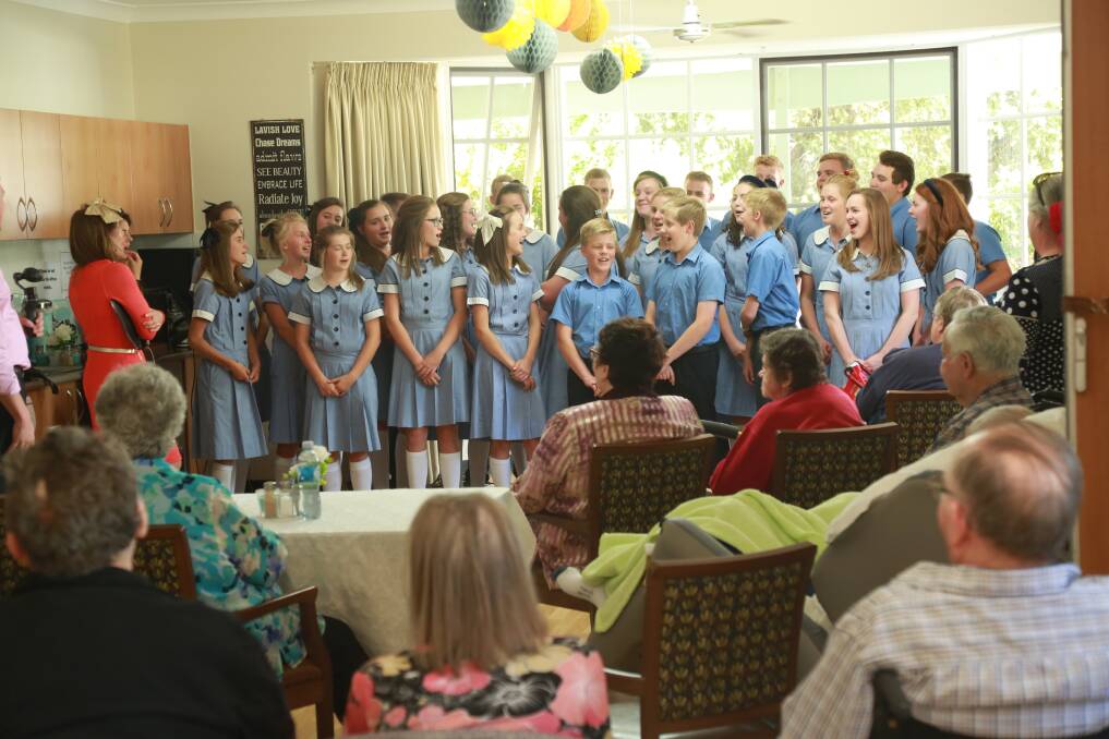 COMMUNITY INVOLVEMENT: Students from the Orange MET School choir shared the Christmas spirit with aged care residents on Friday. Photo: PHIL BLATCH 1125pbaged2