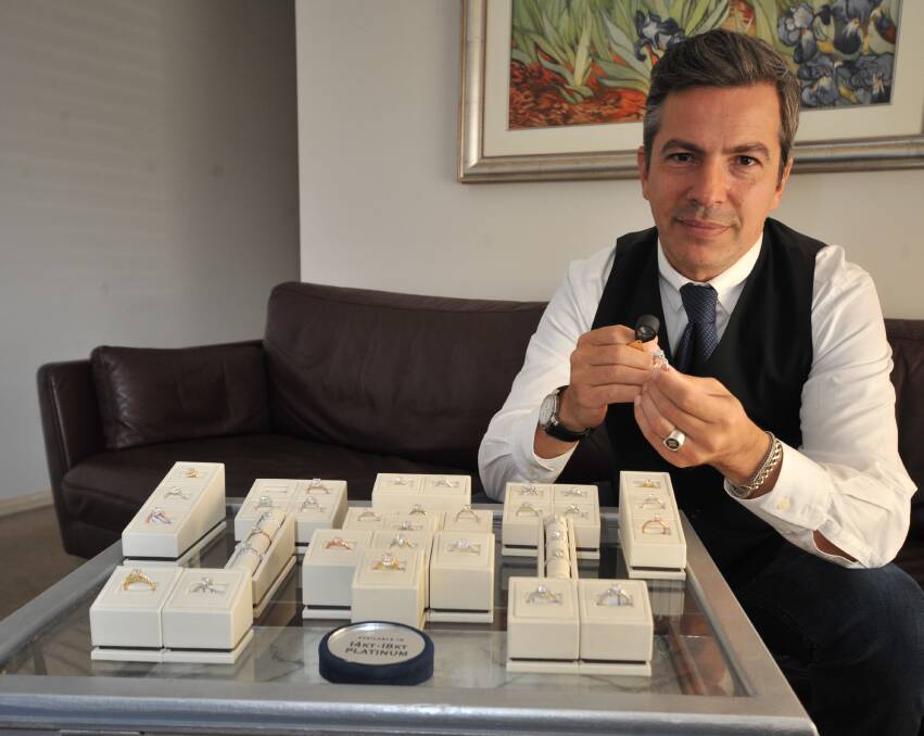 FINE JEWELLERY EXPERT: aPop Jewels owner Alin Pop with ring samples. Photo: JUDE KEOGH