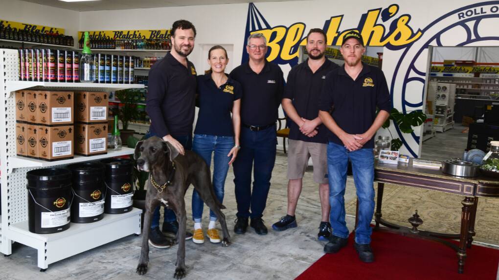 Allan and Susie Blatch, Philip Branwhite, Andrew Dunkley, Kelvin McCarron with Freddie the dog at Blatch's new store in Orange. Picture by Jude Keogh