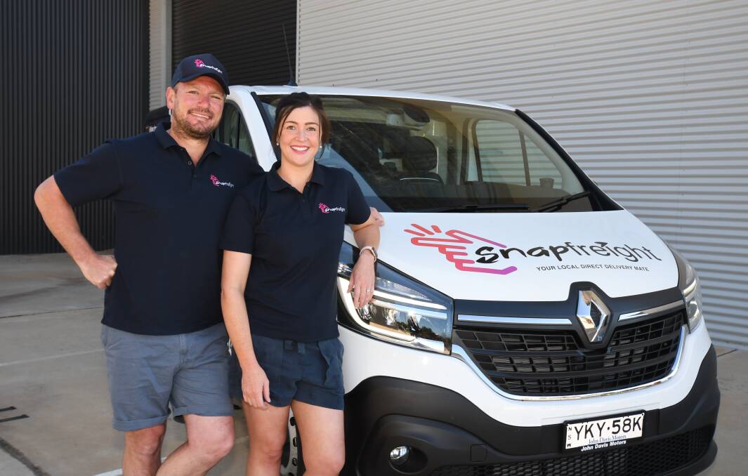 DELIVERY SERVICE: Snapfreight owners Zach and Jess Davidson with one of their three vans. Photo: CARLA FREEDMAN