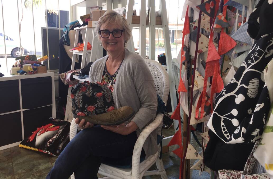 HASHTAG HELP: Get Stitched Up Sewing Solutions sole proprietor Lisa Martin, with a boot and sock protector, received extra inquiries due to the Buy from the Bush initiative.