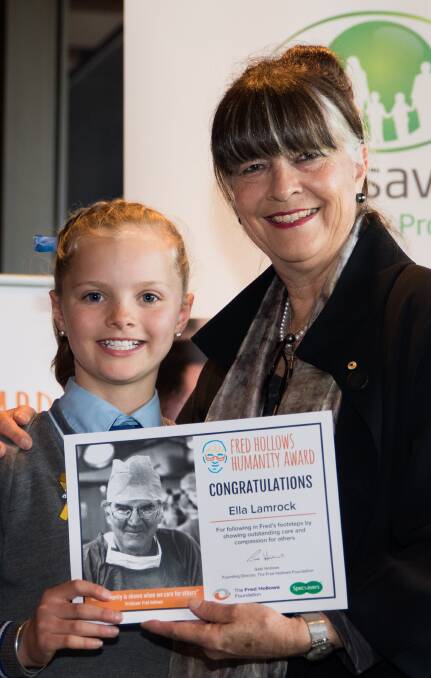 WELL DESERVED: Calare Public School student Ella Lamrock received the Fred Hollows Humanity Award from Gabi Hollows at NSW Parliament House. PHOTO: Contributed
