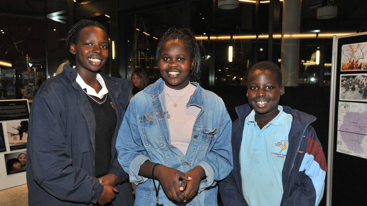 OUT AND ABOUT: Achok Aluk, Marsela Koko and Akok Aluk attended the opening of the photographic exhibition at Orange Regional Museum. Photo: JUDE KEOGH