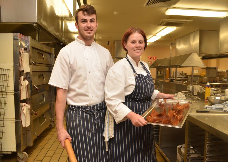 SERVING UP EXPERIENCE: Zachary Bondareff and Amiee Sharp prepared French cuisine for the Dharra Ngurang restaurant on Tuesday, as a part of the certificate three in commercial cookery. Photo: EMILY BENNETT
