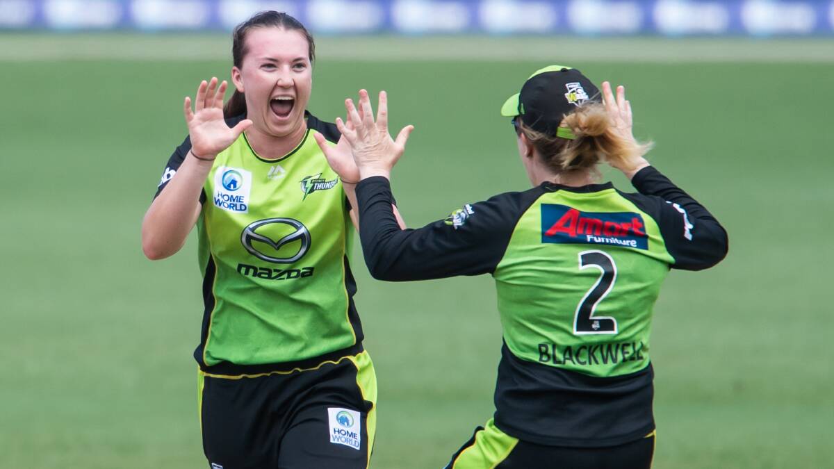 CELEBRATION: Rachel Trenaman and Yenda's Alex Blackwell come together after a wicket with Sydney Thunder last season.