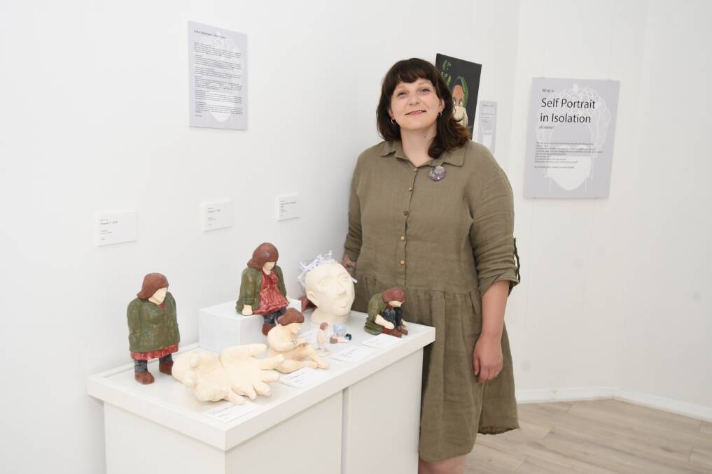 SENSE OF SELF: Maria Shaw with some of her pieces at The Peisley St Gallery. Photo: JUDE KEOGH. 