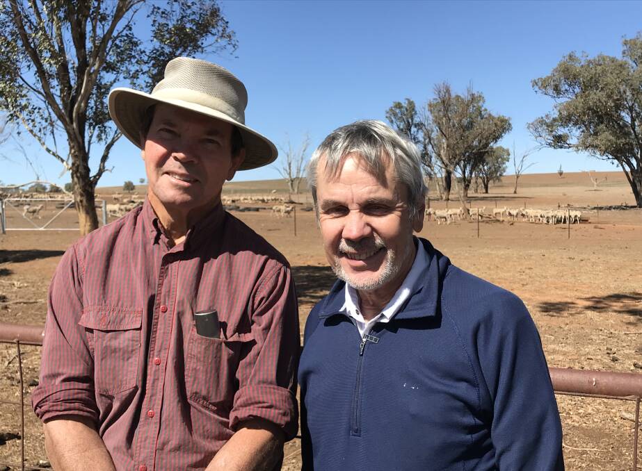 DRY: Farmer Rob Lee with the author of the Climate Council report professor Will Steffen at Mr Lee's property in 2019. Photo: SUPPLIED.