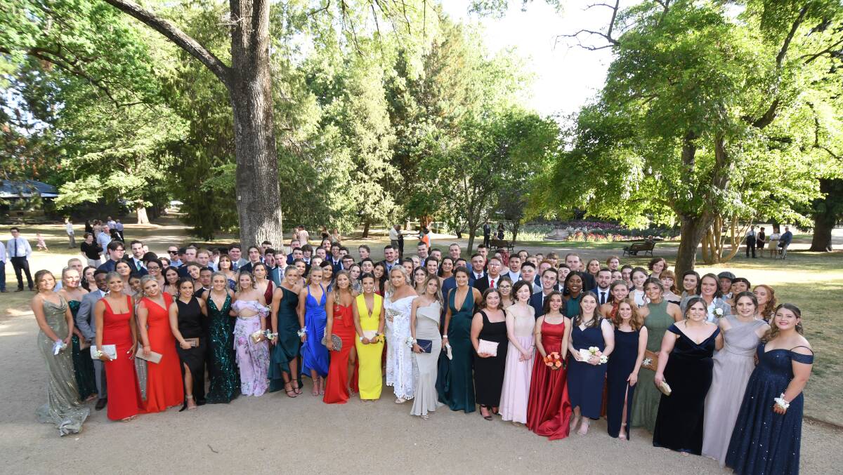PRE-COVID: Orange High School students pose for their school formal photo in Cook Park last year.
