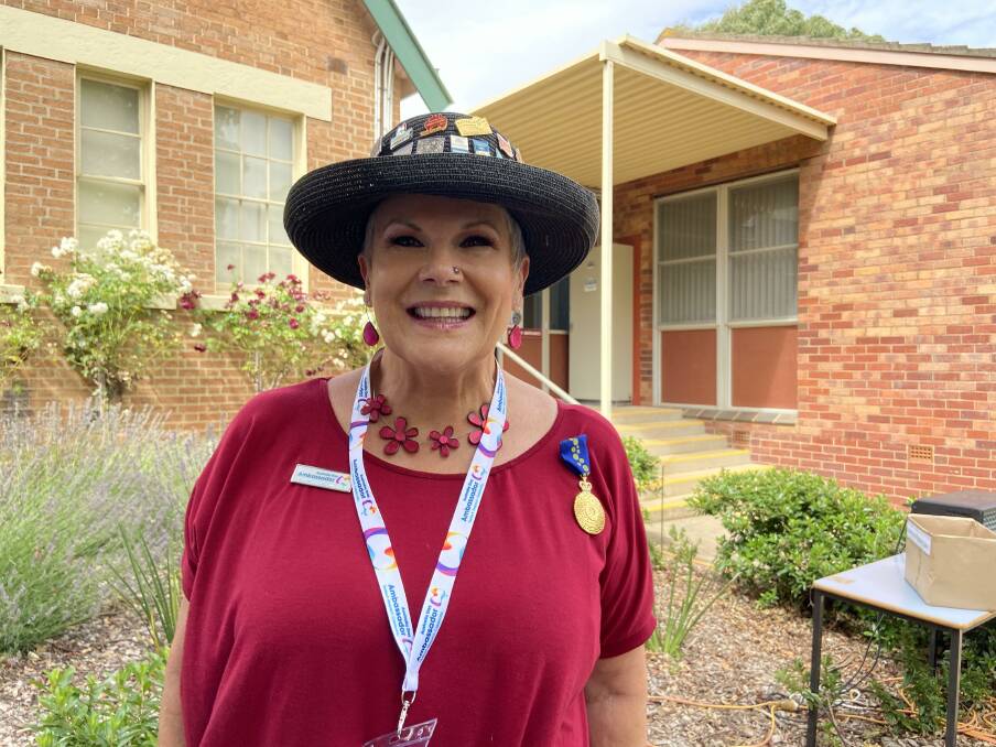 GUEST OF HONOUR: Australia Day ambassador, media personality Susie Elelman. Her hat has 22 pins, one for each year she's been an ambassador. Photo: PETER HOLMES. 