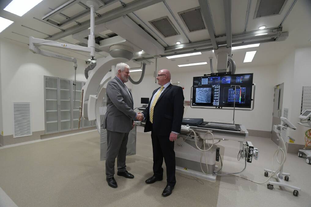 HEARTENING: Ramsay Health's Danny Sims with Dudley Private Hospital's Paul McKenna at the new cardiology facility. Photo: CARLA FREEDMAN.
