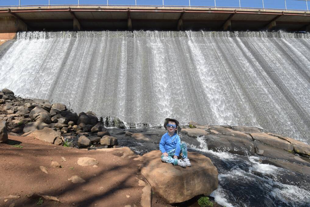 WATER WISE: George Wilkinson goes with the flow at the Lake Canobolas spillway after heavy rains in September. Photo: CARLA FREEDMAN.