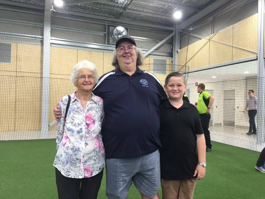 SPECIAL DAY: Kathy Sharpe with family members Colin Sharpe and Cooper Johns at the cricket centre at Wade Park. Photo: PETER HOLMES