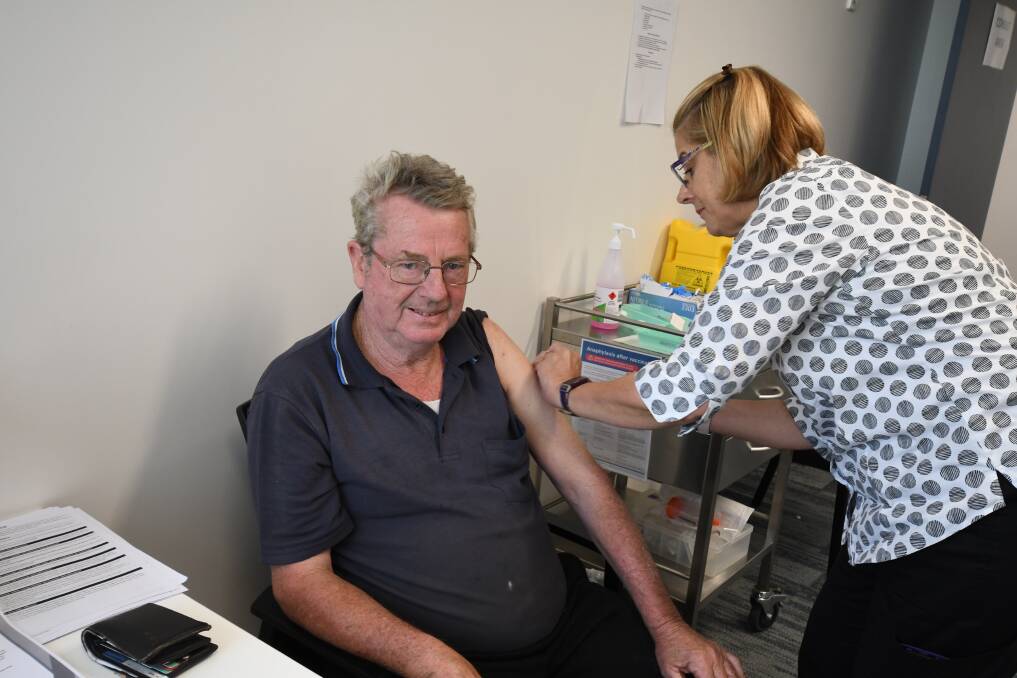 PHASE 1B: Nurse Sue Kuter administers the vaccine to Lee Stuart at Bloomfield Medical Centre on Wednesday. Photo: JUDE KEOGH.