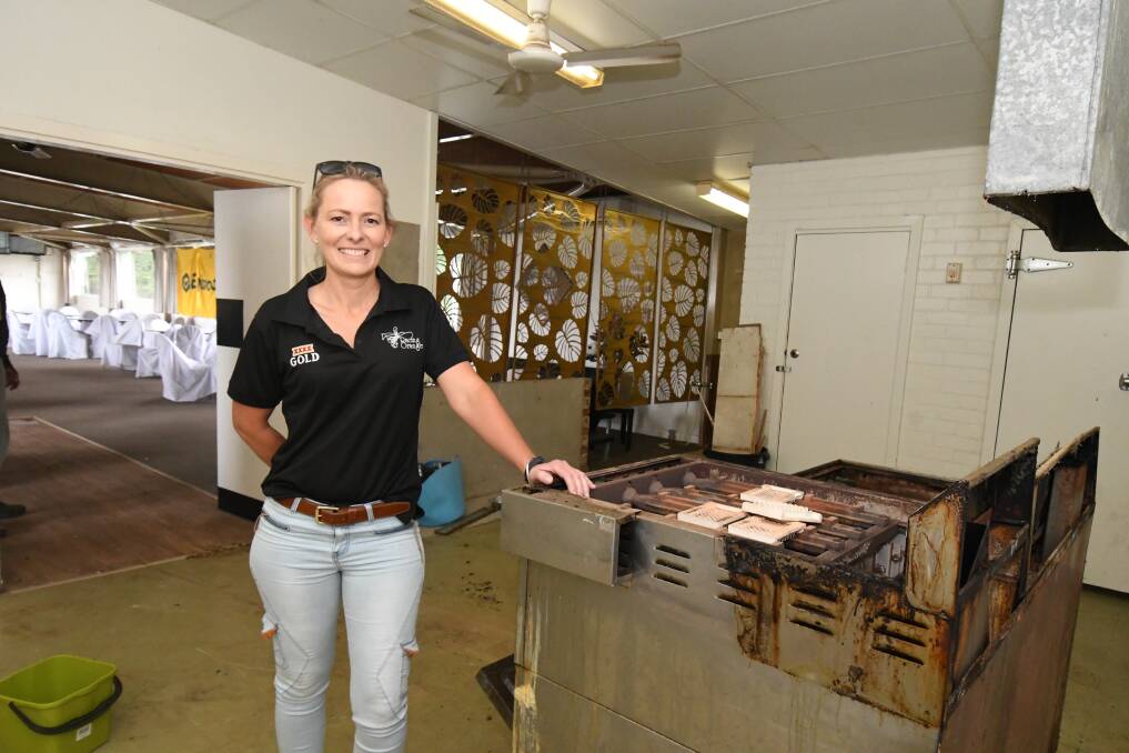 MAKEOVER: Bree McMinn in the old kitchen at Towac Park Racecourse. Photo: JUDE KEOGH.