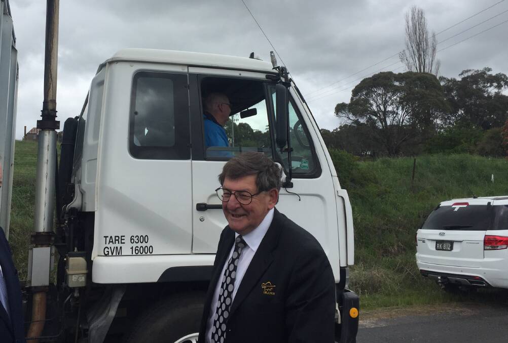 PAT ON THE BACK: A truck driver pulls over to tell mayor Reg Kidd how much he is enjoying the new Southern Feeder Road. Photo: PETER HOLMES.