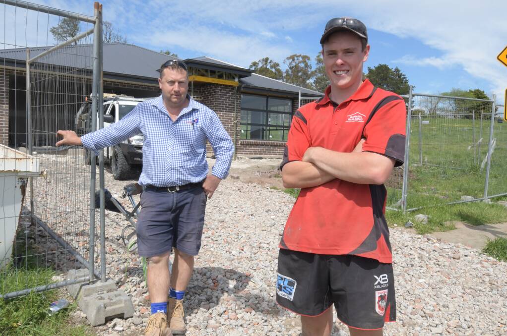 OPPORTUNITY: Mick Banks from Banksia Building with second-year apprentice Pat Williams at a building site in North Orange. Photo: JUDE KEOGH
