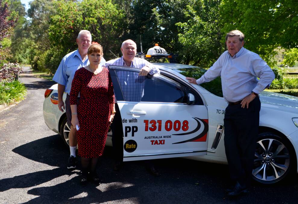 FREE RIDE: Taxi co-op chairperson Ged Dening, road safety officer Andrea Hamilton-Vaughan, Orange Liquor Accord chairman Mark Murphy and mayor Reg Kidd. 
