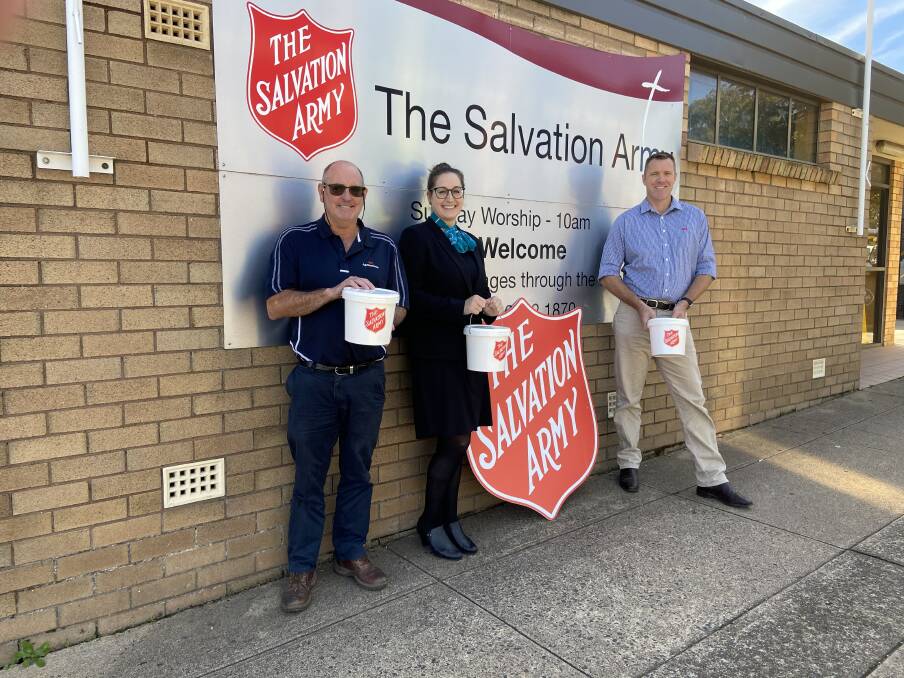 HELP WANTED: Red Shield Appeal chairman Tony Rodd, The Remington Orange's Emily D'Aquino and volunteer Chris Eyles. Photo: PETER HOLMES. 