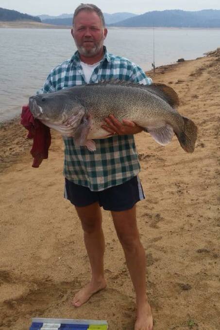 Garth Collins with a Murray Cod caught at Wyangala Dam.