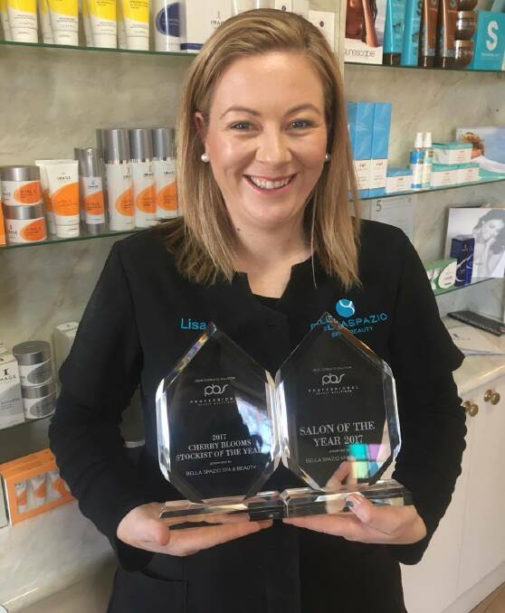 WINNER, WINNER: Lisa Fowler from Bella Spazio with the business' two national awards. 