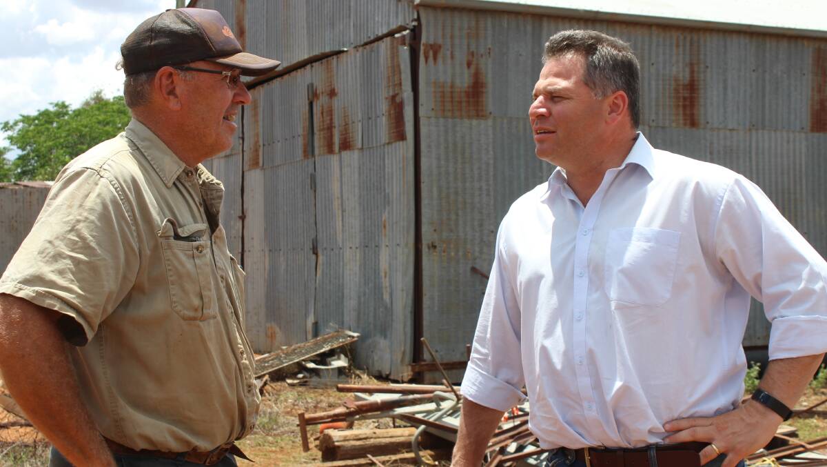 HAPPY DAYS: Farmer Wayne Dunford, who has benefited from registration refunds chats to Phil Donato. OHOTO: SUPPLIED.
