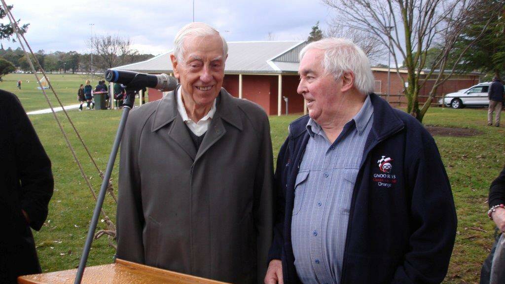 TRIBUTE: Ron Tauranac with Gnoo Blas Classic Car Club president Denis Gregory at a memorial to Sir Jack Brabham after his death in 2014. 