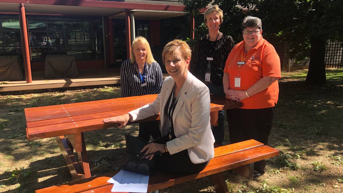 HAPPY DAYS: Acting principal Michelle Barrett, at front, with RHM house manager Bronwyn Cooper, executive officer Rebecca Walsh and RMH volunteer Narelle Gordon.