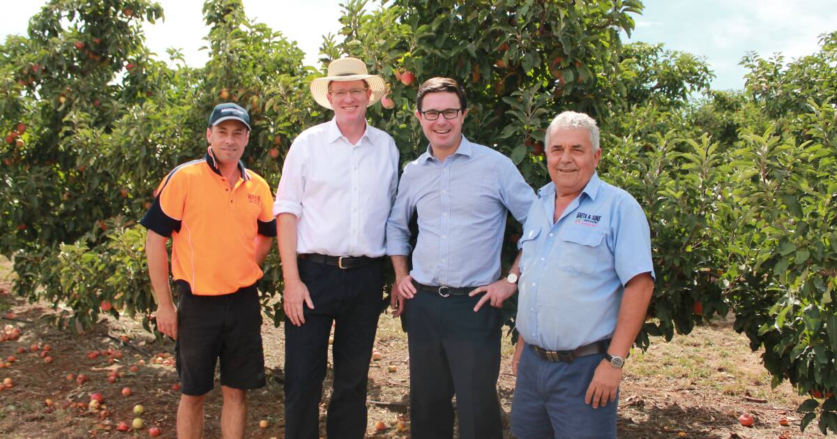 RELIEF: Member for Calare Andrew Gee, and Minister for Drought, David Littleproud met with Orange orchardists Michael and Guy Gaeta to discuss the extension of the On-Farm Emergency Water Infrastructure Rebate. Photo: SUPPLIED.