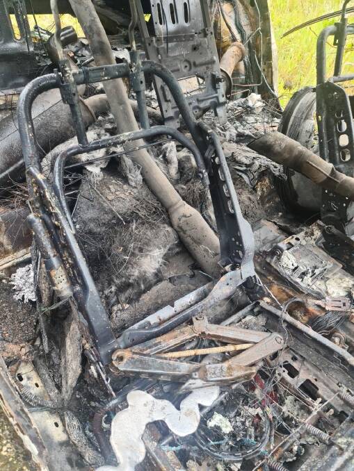 DESTROYED: The sedan was totally destroyed by fire.
