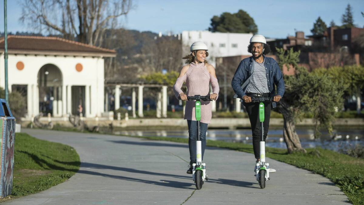 GET ON BOARD: Riding a hired scooter to work maybe a thing of the future if the government agrees to a trial. Photo: SUPPLIED.