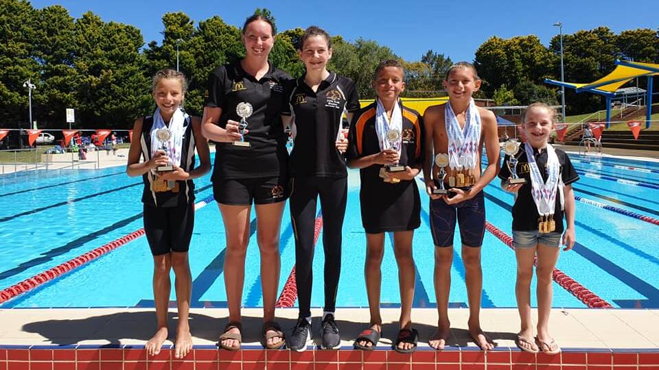 CHAMPIONS: Six of City of Orange's age champions show off their spoils from last weekend's Mountains and Plains Swimming Championships. Photo: CONTRIBUTED
