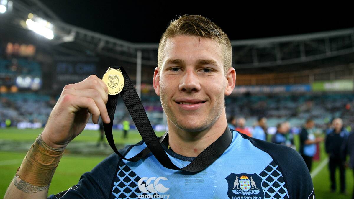 STAR: Dubbo's Matt Burton proudly shows off his man-of-the-match medal from Wednesday's under-20 State of Origin win.