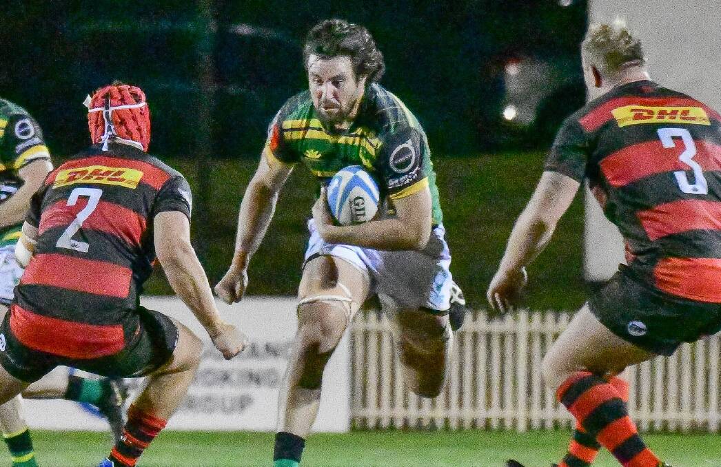 ON THE RISE: Gordon skipper Jordy Goddard crashes into Norths' line last week, he'll lead his Highlanders at Wade Park against Easts this weekend. Photo: ANDREW QUINN/GORDON RUGBY