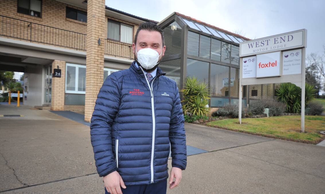FEELING IT: A masked-up West End Motor Lodge manager Paul Keevil says hotels and motels have felt the impact of the COVID-19 pandemic.Photo: JUDE KEOGH