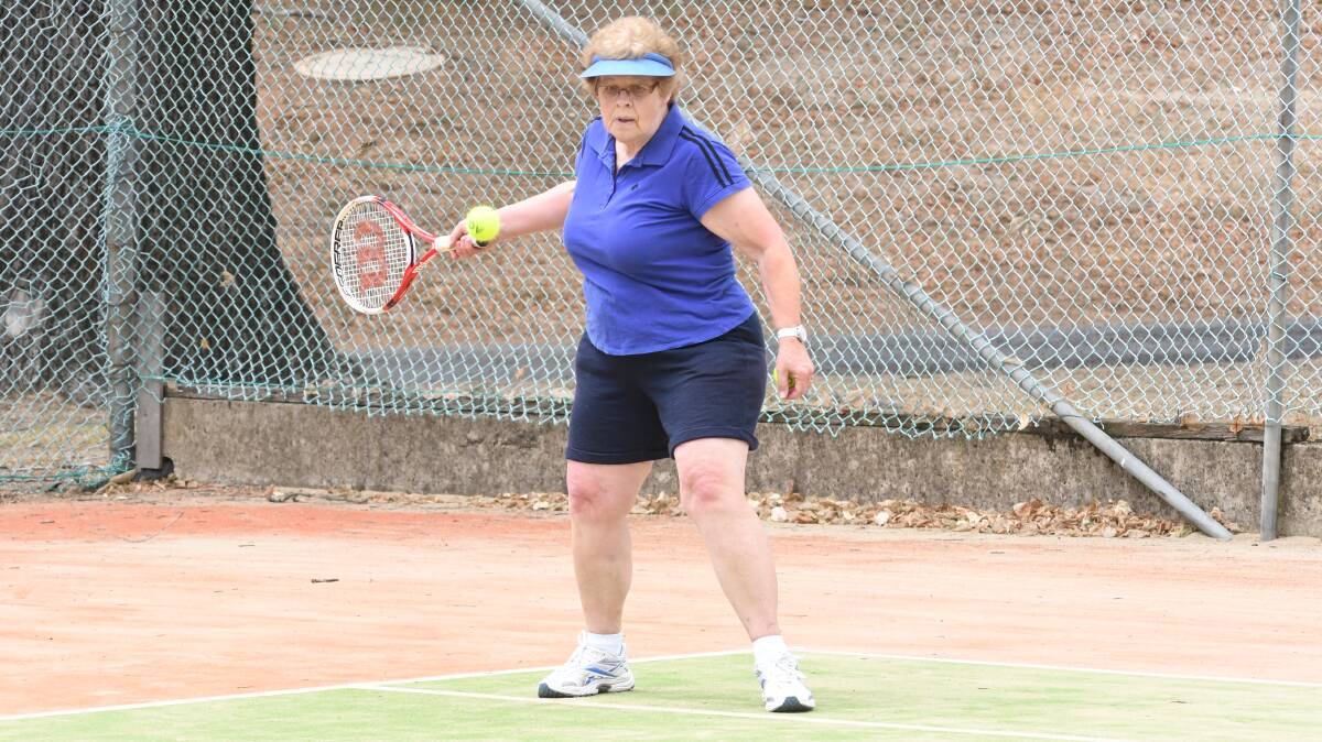WINNER: Mary Baxter shapes to smash a forehand back during last Sunday's Mixed Social competition, it's one that runs every weekend and gets a great roll-up. Photo: CARLA FREEDMAN