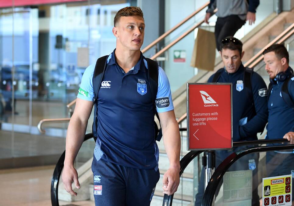REDEMPTION BID: Orange's Jack Wighton arrives back at Sydney with his NSW squad following Wednesday's narrow defeat. Photo: AAP/JOEL CARRETT