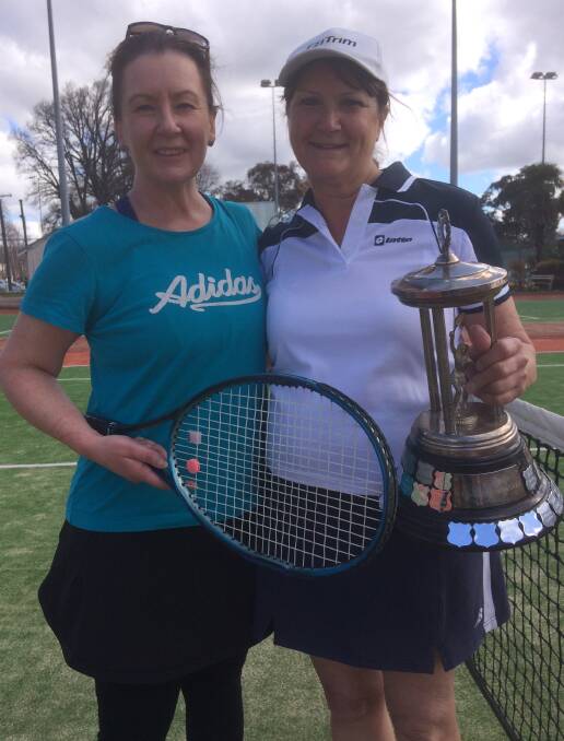 MAIDEN WIN: Chrissie Kjoller (right) celebrated her first singles championship last weekend, defeating Sue Vaughan (left) in the final.