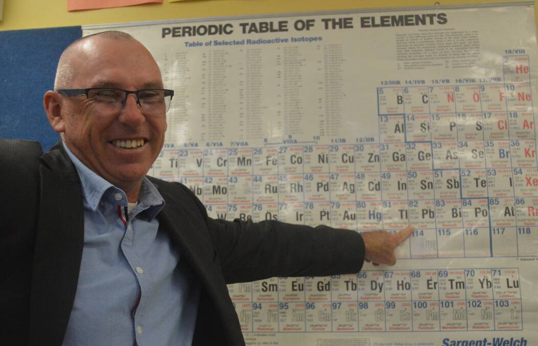 ELEMENT OF SURPRISE: OHS head teacher of science Pete Shea points out his favourite element lead, ahead of next week's visit from the University of Sydney. Photo: MATT FINDLAY